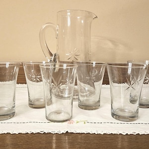 Antique Glass Pitcher and 6 Glasses with Starburst Etching.