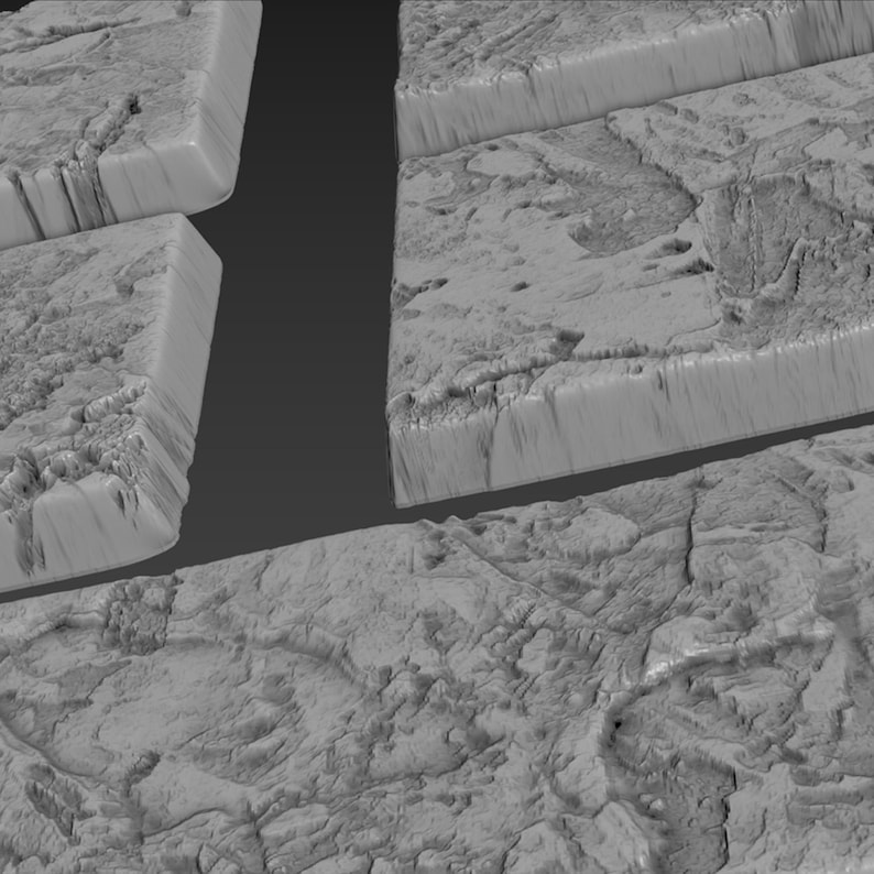May include: Close-up of four gray textured square tiles with a rough, uneven surface. The tiles are arranged in a staggered pattern, creating a unique and interesting design.