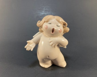 NAO 2003 Singing Cheeky Cherub Figurine