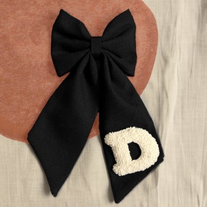 Handmade, linen, punch needle embroidered hair bow personalized with initials.