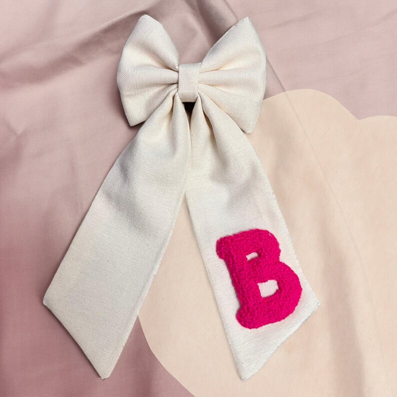 Handmade, linen, punch needle embroidered hair bow personalized with initials.