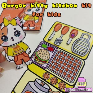 Puede incluir: Un colorido kit de manualidades de papel para niños con un gato de dibujos animados como chef. El kit incluye una hamburguesa, una gofrera y utensilios de cocina. El texto de la imagen dice "Burger kitty kitchen kit for kids" y "Digital Download".
