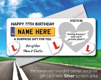 May include: A white and yellow scratch-off card with a car license plate design. The card says "Happy ??th Birthday" and "Name Here". It also says "A Surprise Gift For You" and "Lots of Love Mum & Dad xx". The card has a silver scratch-off area in the shape of a heart. The scratch-off area says "Driving Lessons? New Car?? Private Plate??".