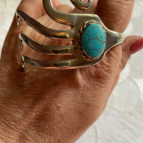 Boho chic silverware cuff fork bracelet with faux  turquoise cabochon. Swan shaped. No silver markings, does not test for silver.