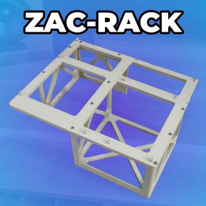 May include: A light beige metal rack with the text "ZAC-RACK" in white. The rack has a rectangular top and a geometric design with supporting beams. The background is a gradient of blue and white.