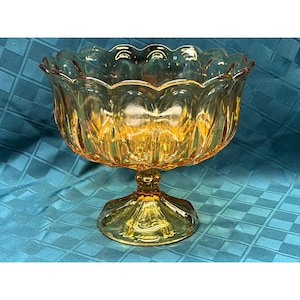 Un (1) cuenco con pedestal con base Starburst Amber Fairfield de Anchor Hocking vintage