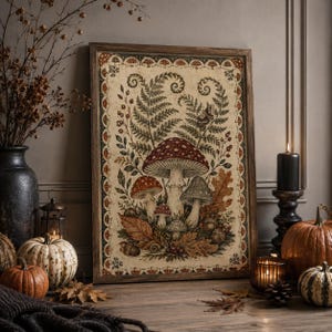 May include: A rectangular framed wall art print featuring a detailed botanical illustration of various mushrooms, fern fronds, and oak leaves. The artwork is bordered by a decorative scalloped pattern of small mushrooms on a cream-colored background.