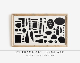 May include: Black and white abstract art print in a wooden frame. The print features a variety of geometric shapes, including circles, squares, triangles, and rectangles.