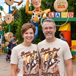 Sheriff Woody PNG, Toy Story Sublimation, Reach For The Sky, Disney Vacation Tee, Toy Story Land DTF, Hollywood Studios, Best In The West, Toy Story Family, Disney World PNG, Pixar Cowboy Design, Disney Trip Transfer, Retro Disney Shirt, Digital Download, Bucking Bronco Graphic, Flying Saucer, Vintage Western Art, Toy Story Birthday, Disney Bound Outfit, Retro Theme Park Tee, Sublimation Design File, DTF Transfer Print, Sheriff Badge PNG, Andys Room Toys, Toy Story Party, Disney Sublimation