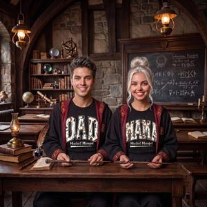 May include: Two black t-shirts featuring the words DAD and MAMA in a patterned font, with the text Mischief Managed and a wand graphic underneath. Both shirts are worn under dark robes with red trim, and each person holds a wooden wand.