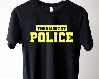 May include: Black t-shirt with yellow text that reads "Thermostat Police".