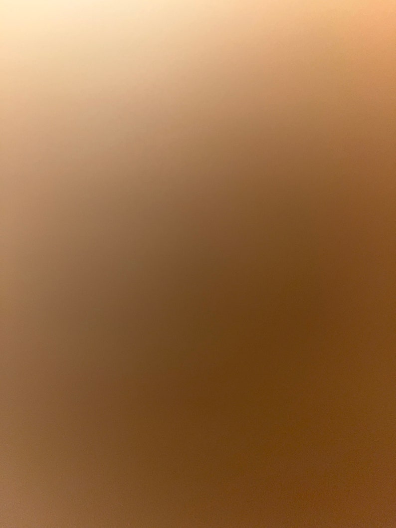 May include: A solid brown background with a gradient from light to dark brown.