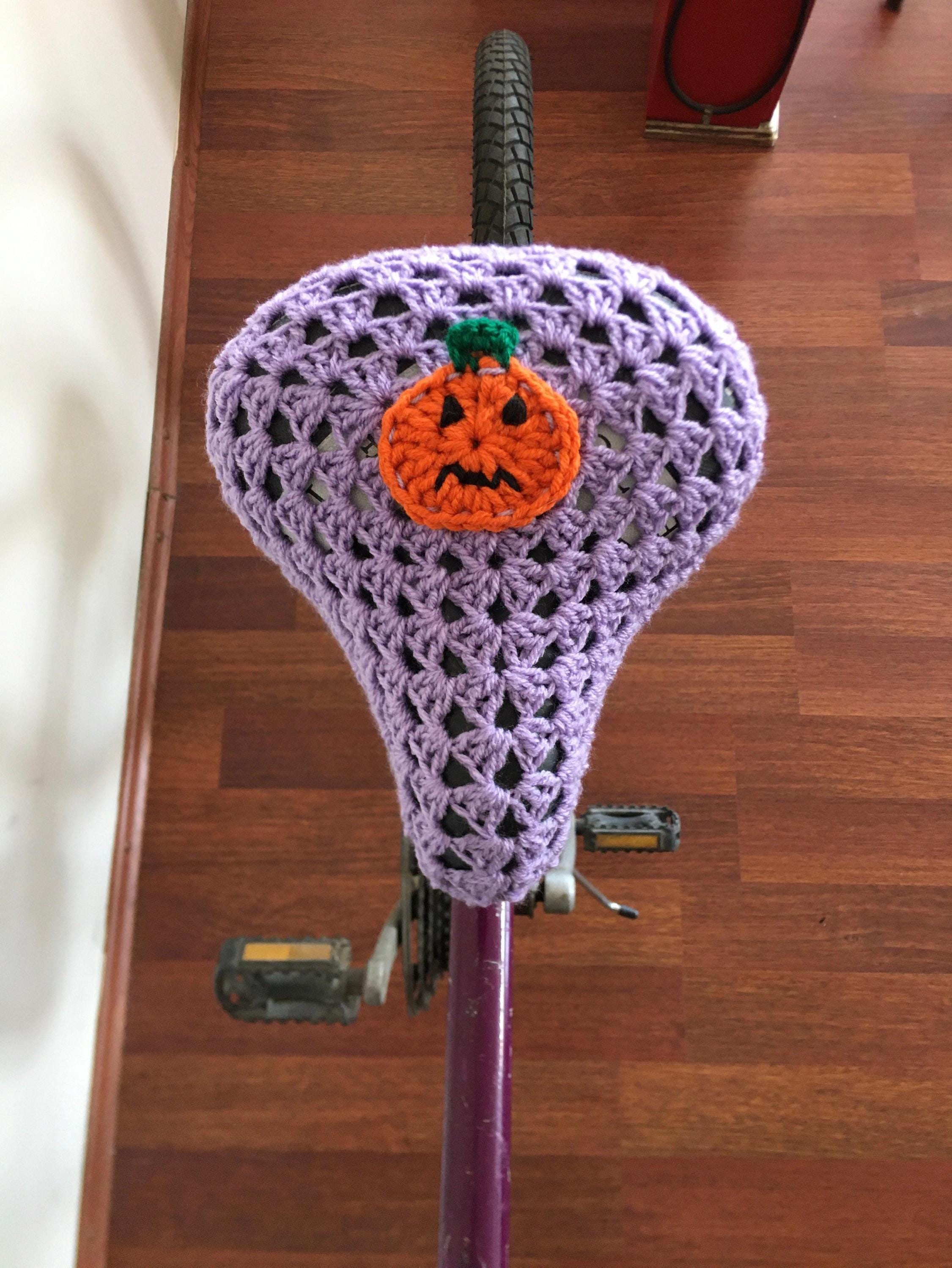30 Bicycle Crochet Patterns for Bikes, Decor, Gifts, and Cozy Home Projects 11 Halloween Pumpkin Bicycle Saddle Pattern
