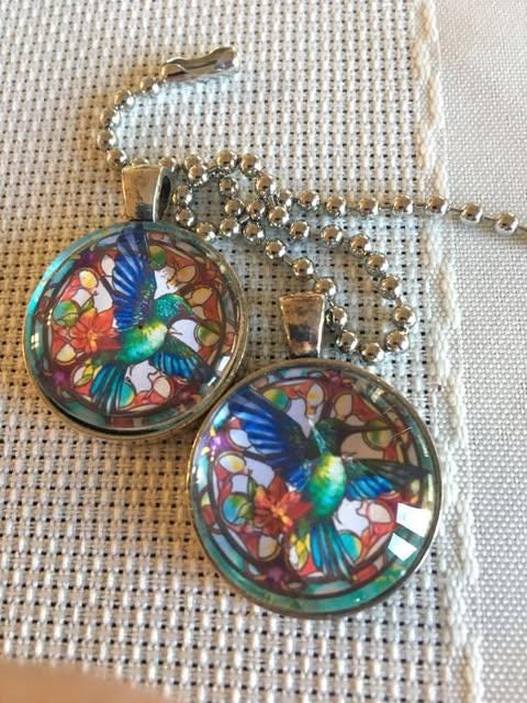 Set Of 2 Coordinating Rainbow Hummingbird Floral Fan/Light Pull Set
