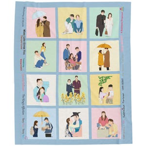 May include: A light blue blanket with a grid of illustrations depicting couples in various scenes. The blanket includes text such as "Suspicious Partner" and "A Business Proposal" along the side.