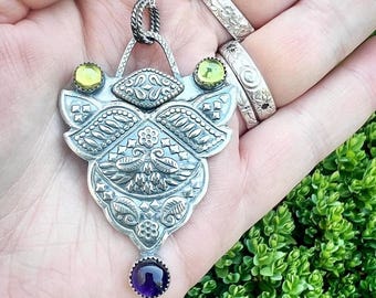 Mae’s Sterling, peridot, and amethyst pendant