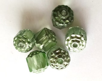 6 delicate green glass beads