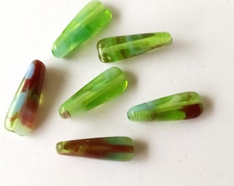 6 elongated multicolored glass beads