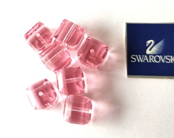 7 cube beads from Swarovski in pink