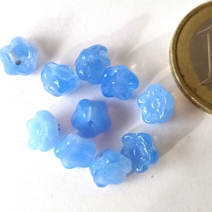 10 light blue glass beads in the shape of flowers image 3