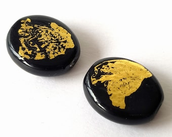 2 flat black glass beads with gold foil