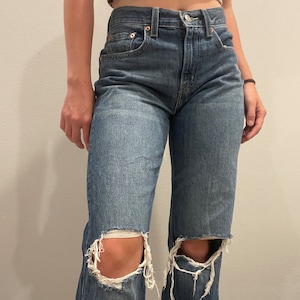 Vintage Straight Legged Ripped Levi Jeans