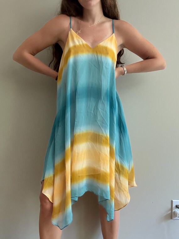 blue and yellow midi dress Hope & Ivy shirred bust tie back mix print midi dress in blue and yellow floral