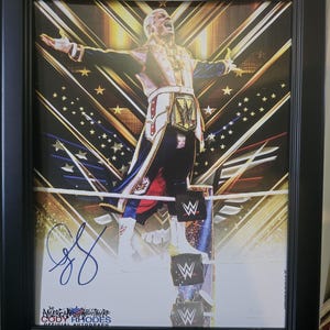 コーディ・ローズ 無敗の WWE チャンピオン 直筆サイン入り写真