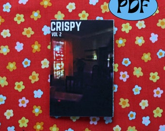 May include: A black and white photo of a room with a window and a table. The text "CRISPY VOL 2" is printed on the front of the photo.