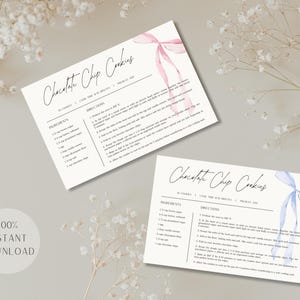 May include: Two printable recipe cards for chocolate chip cookies. The cards feature a watercolor design of pink and blue ribbons. The text on the cards reads "Chocolate Chip Cookies".