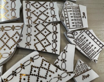 Mosaic tiles-fun white and gold tiles for mosaic or jewelry making- calendar days and fine lace looking golden design. Recycled material