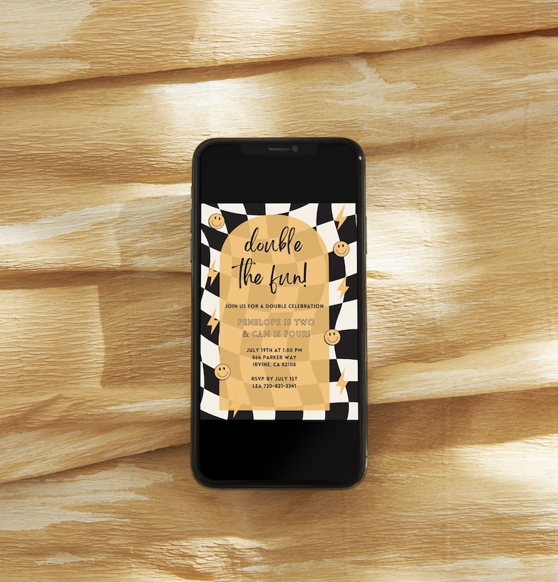May include: A digital invitation on a smartphone screen with a black and white chequered background and gold accents. The text reads "double the fun!" and includes details for a birthday party for Penelope and Cam.