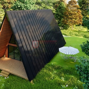 May include: An A-frame cabin featuring a dark metal roof, natural wood siding on the front gable, and a wooden deck. The structure includes large glass windows and doors, positioned near a small stream with a wooden bridge and a striped umbrella.