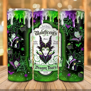 May include: A green and purple tumbler with a design featuring Maleficent from Disney's Sleeping Beauty. The design includes a label that reads "Dark Fairy Potions & Powders Maleficent's Pure  Finely Distilled Dragon Tears 1528".