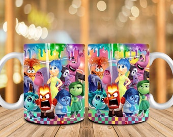 May include: Two white ceramic mugs with a colorful design featuring characters from the movie Inside Out. The design includes Joy, Sadness, Anger, Fear, and Disgust. The mugs have a rainbow drip effect and a checkered pattern.