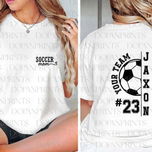 May include: White t-shirt with black text that says "Soccer Mom" on the front and "Your Team #23 Jaxon" on the back. The back design also includes a soccer ball.