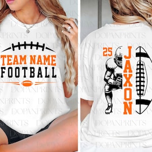 May include: White t-shirt with a football design. The front features the text "TEAM NAME FOOTBALL" in black and orange, with a football graphic. The back displays a football player graphic and the name "JAXON" with the number "25".