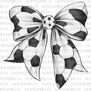 May include: A black and white bow with a soccer ball design. The bow is tied in a knot and the ends are curled.