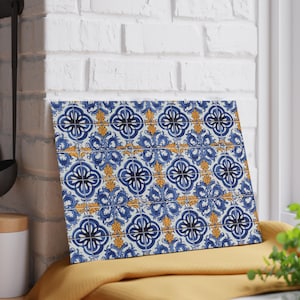 May include: A blue and yellow patterned tile design on a rectangular canvas. The tile pattern features a repeating motif of blue and white floral shapes with yellow accents.