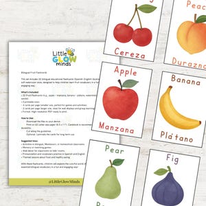 May include: Educational bilingual fruit flashcards with watercolor illustrations. The cards feature fruits like cherries, apples, bananas, and pears, with the fruit names in both English and Spanish. The set includes a description of the product.
