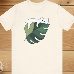 Minimalist Cat on Leaf T-Shirt | Cute Monstera Plant Cat Tee for Nature & Cat Lovers, Unisex Tee, Graphic Tee, Cat Shirt, Animal Tee, Short