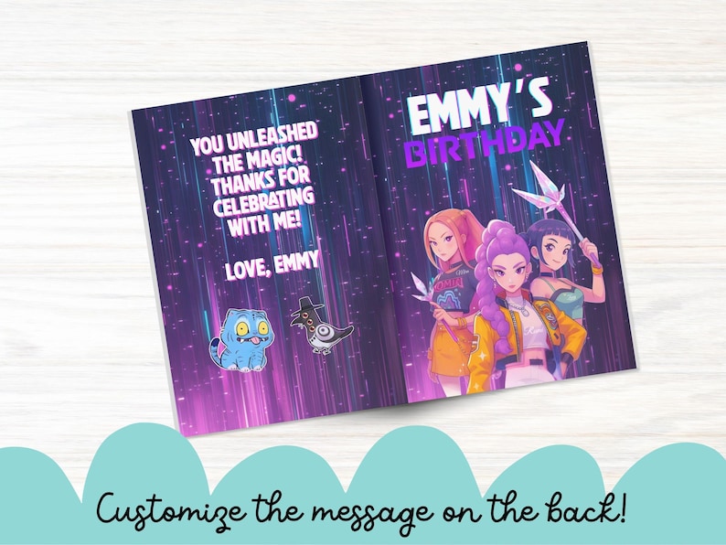 May include: A birthday card with a purple and blue background, featuring anime-style illustrations of three girls and the text "EMMY'S BIRTHDAY." The inside reads "YOU UNLEASHED THE MAGIC! THANKS FOR CELEBRATING WITH ME! LOVE, EMMY."