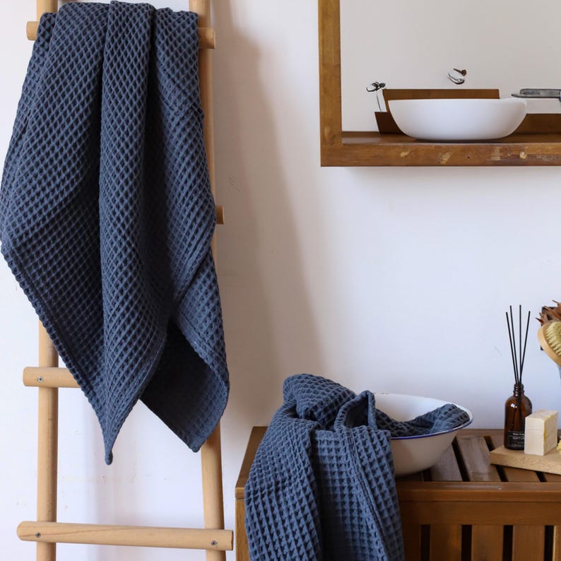 Soft waffle towel hanging in bathroom — waffle face towel washcloth in OEKO-TEX Turkish cotton