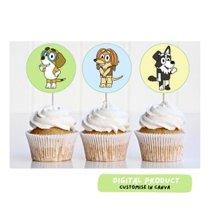 May include: Three cupcake toppers featuring cartoon dogs with different expressions. The toppers are on top of cupcakes with white frosting. The text "DIGITAL PRODUCT CUSTOMISE IN CANVA" is on a green rectangle at the bottom of the image.