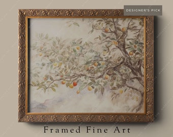 May include: A framed watercolor painting of a tree branch with leaves and fruit. The painting is in a gold frame with an ornate design. The text "Framed Fine Art" and "curated by MADELYNN AVE" is below the painting.