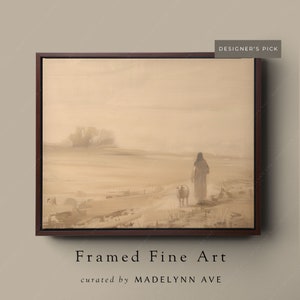 May include: A framed painting of a person walking with a sheep in a field. The painting is done in muted tones of brown and beige, creating a sense of peace and tranquility.