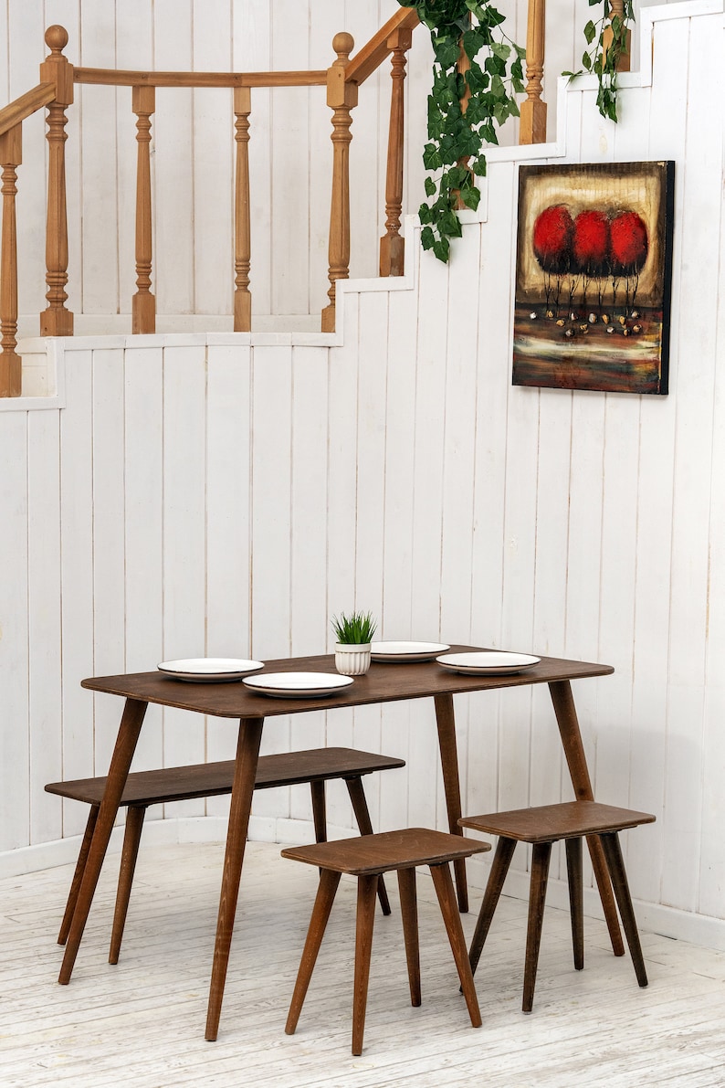 🍽️ Space Saving Rectangle Narrow Small Dining Table Set – Walnut Wood Bench & Stool Kitchen Set

Maximize your space without compromising style with this rectangle small dining table set. Crafted from warm walnut wood, this wooden dine table set combines modern minimalist design with rustic charm, making it perfect for small kitchens, breakfast nooks, and dining areas.

✨ Why You’ll Love It:

Sleek and minimalist rectangular dining table blends modern aesthetics with handcrafted warmth.