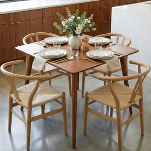 Square Wooden Dining Room Table – Narrow Space Modern Kitchen Dining Table

Small Breakfast Table | Minimal Farmhouse Dining Furniture

This square wooden dining table is thoughtfully designed for small and narrow dining spaces, making it perfect for kitchens, breakfast nooks, apartments, and modern homes. Its clean lines and balanced proportions blend contemporary style with the natural warmth of handcrafted wood, creating a timeless centerpiece for everyday dining.