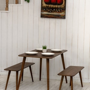 Here is Kitchen Small Walnut Wooden Dining Table Set! This Farmhouse Narrow Dine Table Benches in the dining room perfectly complements and change the cozy home atmosphere, offering a personalized touch to the kitchen.