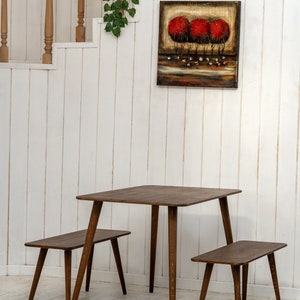 Here is Kitchen Small Walnut Wooden Dining Table Set! This Farmhouse Narrow Dine Table Benches in the dining room perfectly complements and change the cozy home atmosphere, offering a personalized touch to the kitchen.